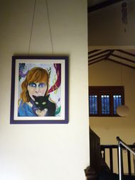 Self-Portrait with Noir: hanging on the wall